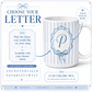 15 oz personalized ceramic mug with blue stripes, bow detail, and initial design