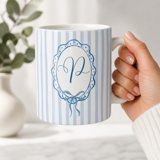 Personalized blue initial mug with bow design and custom letter options